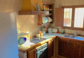 Отдельно стоящий дом с участком на продажу в городе Motril. Фото