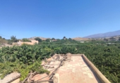 Дом с участком на продажу в городе Motril. Фото