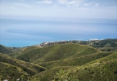 Земля на продажу у города Torrox. Фото