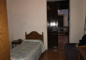 Участок с постройкой на продажу в городе Трухильо. Фото