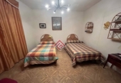 Дом с участком на продажу в городе Трухильо. Фото