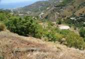 Земля на продажу у города Torrox. Фото