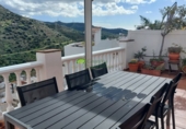 Дом с участком на продажу в городе Torrox. Фото