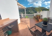 Дом с участком на продажу в городе Torrox. Фото