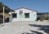 Casa de camp amb terreny en venda a Cómpeta ref.: TR199503 foto