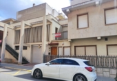 Дом с участком на продажу в городе La Vall d'Uixó. Фото