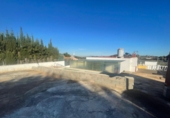 Отдельно стоящий дом с участком на продажу в городе La Vall d'Uixó. Фото