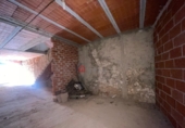 Дом с участком на продажу в городе les Coves de Vinromà. Фото