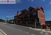 Отдельно стоящий дом с участком на продажу в городе Poio de Arriba. Фото