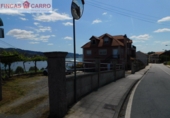 Отдельно стоящий дом с участком на продажу в городе Poio de Arriba. Фото