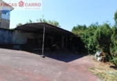 Участок с постройкой на продажу в городе Понтеведра. Фото
