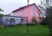 Отдельно стоящий дом с участком на продажу в городе Narón. Фото