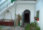 Отдельно стоящий дом с участком на продажу в городе Almendralejo. Фото