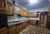 Дом с участком на продажу в городе Motril. Фото