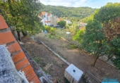 Отдельно стоящий дом с участком на продажу в городе Corbera de Llobregat. Фото