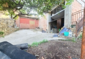 Отдельно стоящий дом с участком на продажу в городе Corbera de Llobregat. Фото