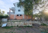 Отдельно стоящий дом с участком на продажу в городе Corbera de Llobregat. Фото