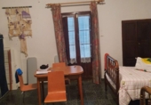 Отдельно стоящий дом с участком на продажу в городе Caudiel. Фото