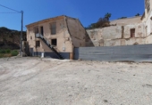 Дом с участком на продажу в городе Lorca. Фото