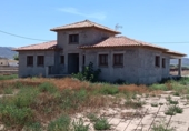 Отдельно стоящий дом с участком на продажу в городе Lorca Фото