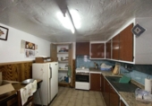 Дом с участком на продажу в городе Каудете. Фото