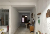 Дом с участком на продажу в городе Каудете. Фото