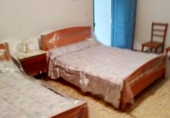 Дом с участком на продажу в городе Quesada. Фото