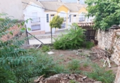 Дом с участком на продажу в городе La Iruela. Фото