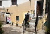 Дом с участком на продажу в городе La Aldea de San Nicolás. Фото