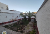 Дом с участком на продажу в городе La Puebla de Cazalla. Фото