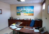 Промышленное здание на продажу в городе Уэльва. Фото