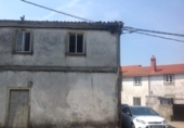 Дом с участком на продажу в городе Сантьяго-де-Компостела. Фото