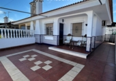 Chalet adosado con terreno en venta en Matalascañas ref: TR306530 foto