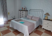 Дом с участком на продажу в городе Quesada. Фото