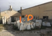 Промышленное здание на продажу в городе Fines. Фото