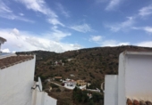 Дом с участком на продажу в городе Torrox. Фото