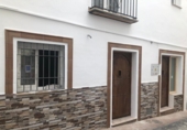 Дом с участком на продажу в городе Torrox. Фото