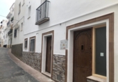 Дом с участком на продажу в городе Torrox. Фото