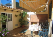 Дом с участком на продажу в городе Torre del Mar. Фото