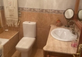 Дом с участком на продажу в городе Torre del Mar. Фото