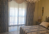 Дом с участком на продажу в городе Torre del Mar. Фото