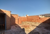 Дом с участком на продажу в городе Vélez-Málaga. Фото