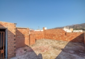 Дом с участком на продажу в городе Vélez-Málaga. Фото