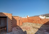 Дом с участком на продажу в городе Vélez-Málaga. Фото
