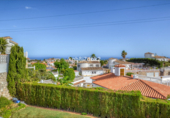 Вилла с участком на продажу в городе Benalmádena. Фото