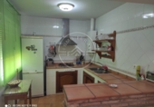 Отдельно стоящий дом с участком на продажу в городе La Carlota. Фото