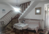 Дом с участком на продажу в городе El Campillo. Фото