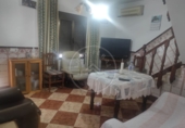 Дом с участком на продажу в городе El Campillo. Фото