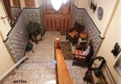 Дом с участком на продажу в городе Вальдепеньяс. Фото