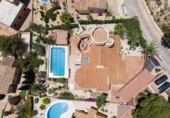 Вилла с участком на продажу в городе Benitachell. Фото